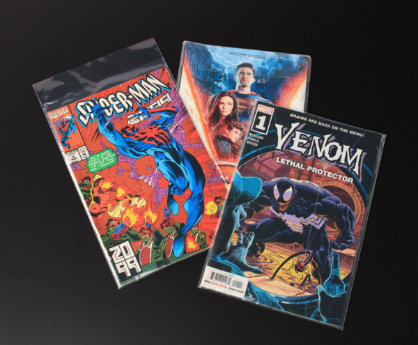 Spider-Man 2099, Superman, and Venom comics in Collector Essentials protective comic book bags